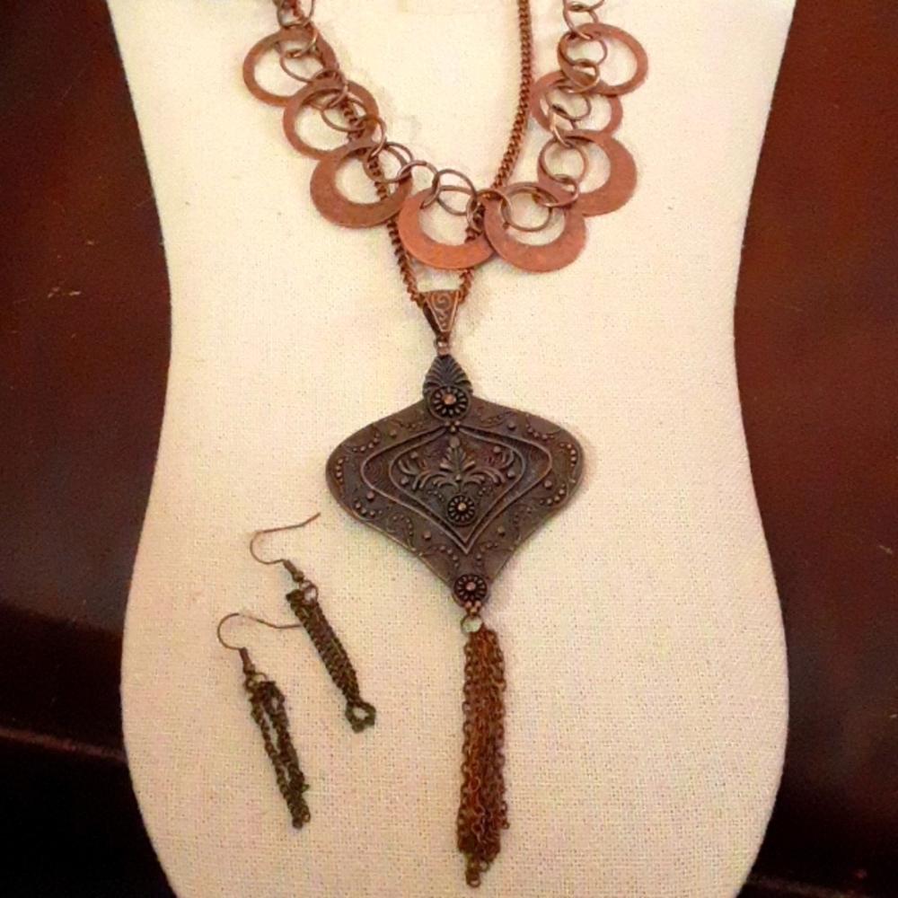 Necklaces and matching pierced earring. Aged copper.